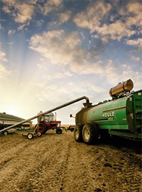 tractor in manure pit image